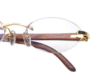 Load image into Gallery viewer, Cartier カルティエ メガネ リムレス ウッドテンプル 眼鏡 アイウェア メタル ウッド 3556828 ブラウン ゴールド金具 美品 中古 4b000059