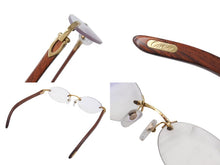 Load image into Gallery viewer, Cartier カルティエ メガネ リムレス ウッドテンプル 眼鏡 アイウェア メタル ウッド 3556828 ブラウン ゴールド金具 美品 中古 4b000059