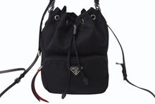 画像をギャラリービューアに読み込む, PRADA プラダ スタッズ 巾着 ショルダーバッグ 1BH038 イタリア製 ナイロン レザー ブラック レッド シルバー金具 美品 中古 4b002886