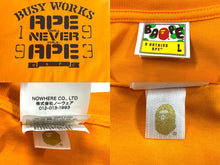 画像をギャラリービューアに読み込む, A BATHING APE アベイシングエイプ 半袖Ｔシャツ オレンジ コットン サイズL 001TEK301352M 美品 中古 4b004359