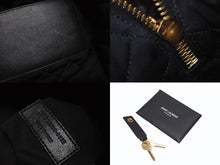 Load image into Gallery viewer, 新品同様 SAINT LAURENT サンローラン YSLロゴ ジャイアントトラベルバッグ キルティング レザー ブラック ゴールド金具 中古 4b005111