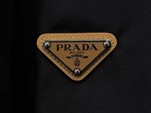 Load image into Gallery viewer, 新品未使用 PRADA プラダ レザートリムミニスカート トライアングルロゴ 21H969 ナイロン ブラック ブラウン サイズ38 中古 4b008815