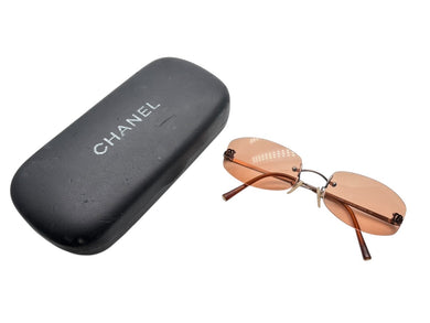 CHANEL シャネル リムレス サングラス 4002 c.116/74 サイズ54□19 130 ココマーク オレンジ ブロンズ 美品 中古 4b009486
