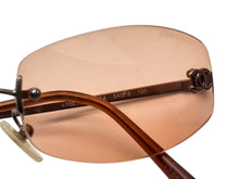 画像をギャラリービューアに読み込む, CHANEL シャネル リムレス サングラス 4002 c.116/74 サイズ54□19 130 ココマーク オレンジ ブロンズ 美品 中古 4b009486