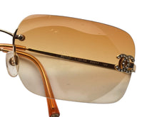 画像をギャラリービューアに読み込む, CHANEL シャネル リムレス サングラス 4017-D c.125/56 サイズ62◻︎17 120 ココマーク ラインストーン オレンジ 美品 中古 4b009805