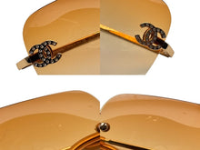 画像をギャラリービューアに読み込む, CHANEL シャネル リムレス サングラス 4017-D c.125/56 サイズ62◻︎17 120 ココマーク ラインストーン オレンジ 美品 中古 4b009805