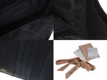 画像をギャラリービューアに読み込む, MIU MIU ミュウミュウ マテラッセ 二つ折り財布 ロゴ イタリア製 レザー メタル ブラック ゴールド金具 美品 中古 4c073970