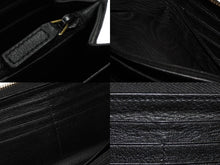 画像をギャラリービューアに読み込む, YVES SAINT LAURENT イヴ サンローラン 長財布 ラウンドファスナー YSLロゴ 352904 レザー ブラック 美品 中古 4c061010